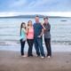 Professional Portrait of a family with Rangitoto Island in the background in Auckland