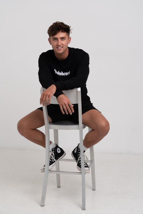 Fashion Photographer North Shore High-end editorial fashion shoot at Wow Photography Studio: a Man wearing a black outfit