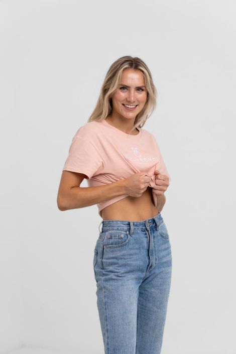 Fashion Photographer North Shore Studio lookbook photography for New Zealand apparel brand: Blond Woman wearing a pink top and a jeans