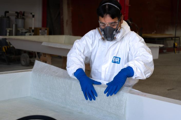 Commercial Photography Auckland Commercial staff photography for Transcold: Worker in protective mask and gloves