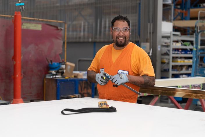 Commercial Photography Auckland Commercial staff photography for Fairfax New Zealand: Smiling Worker