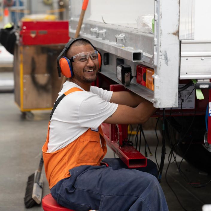 Commercial Photography Auckland Commercial staff photography for Fairfax New Zealand: Smiling Worker