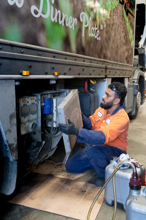 Commercial Photography Auckland Commercial staff photography for Fairfax New Zealand: Man repairing a truck