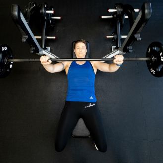 Woman with weights at the gym